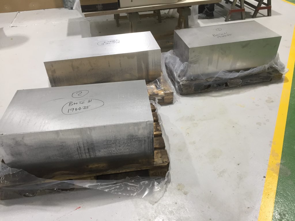 Big Blocks of Aluminium ready to be machined Datum